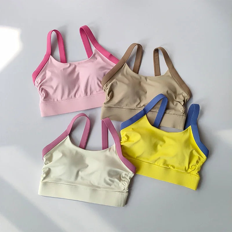 Conjunto de yoga de 2 piezas con espalda cruzada y bloqueo de color de alta intensidad, ropa interior deportiva, leggings de fitness con cintura alta y realce de cadera.