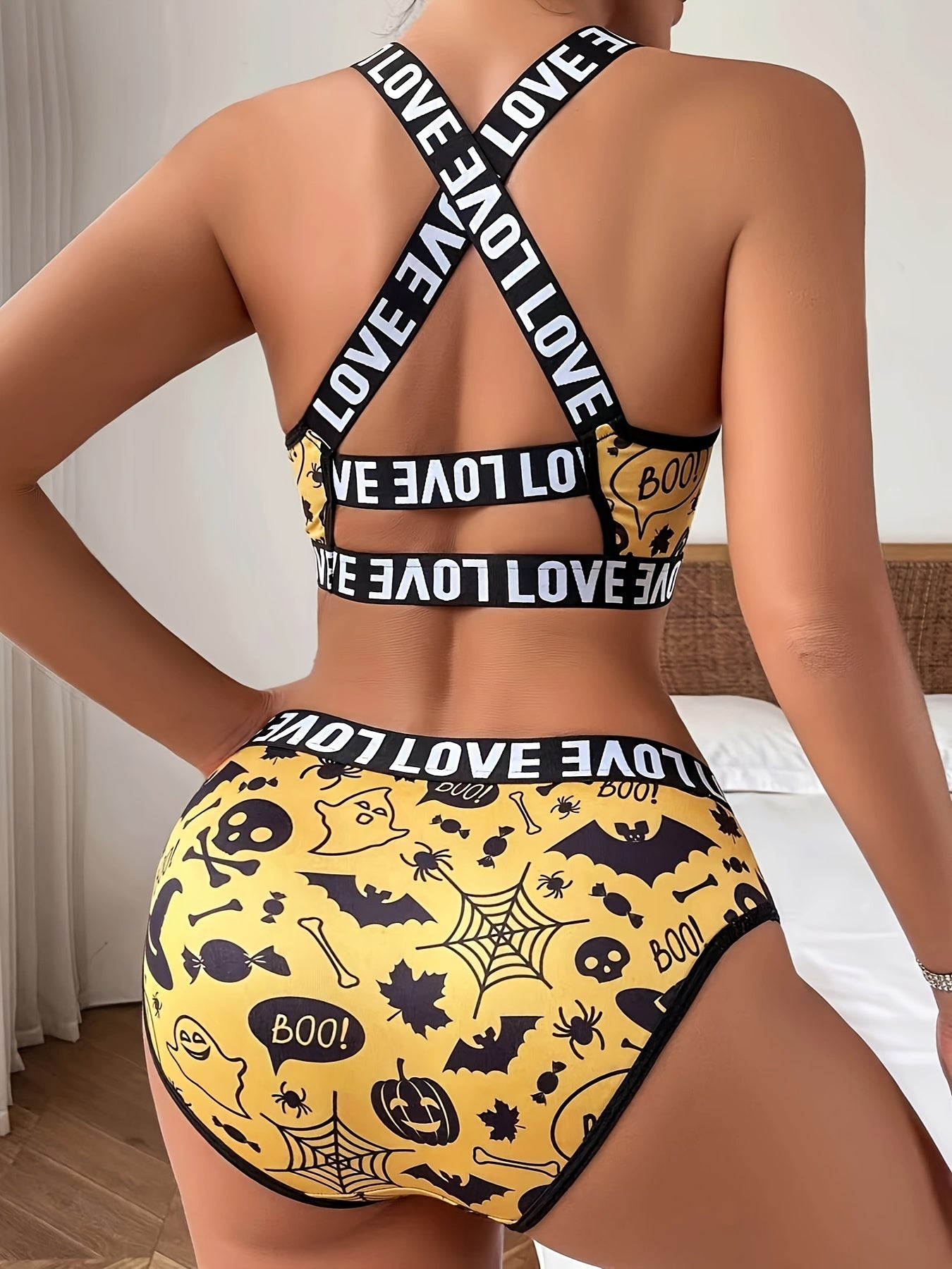 Conjunto de sujetador y braguita deportiva con estampado de calavera de Halloween para mujer: mezcla de poliéster transpirable, diseño cruzado en la espalda.